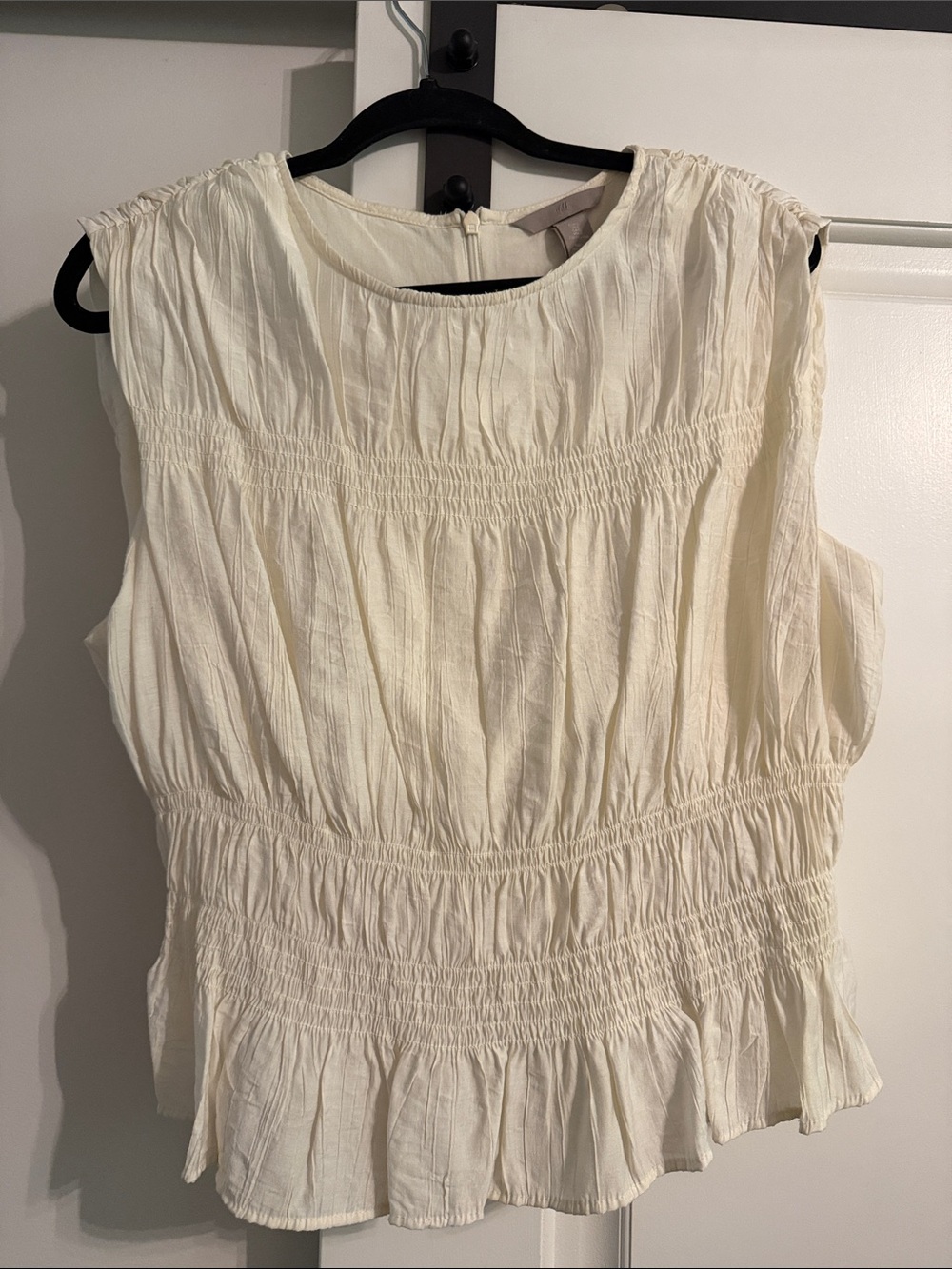 Womens Cream Smocked Sleeveless Peplum Top